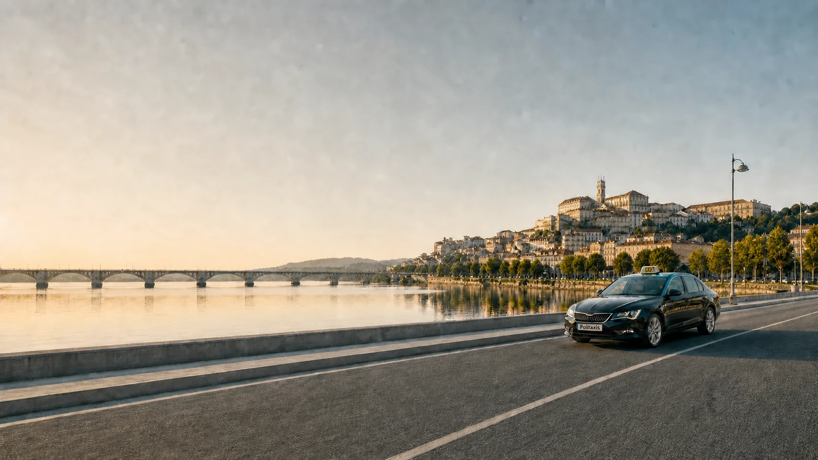 Táxi junto ao rio Mondego e à cidade de Coimbra